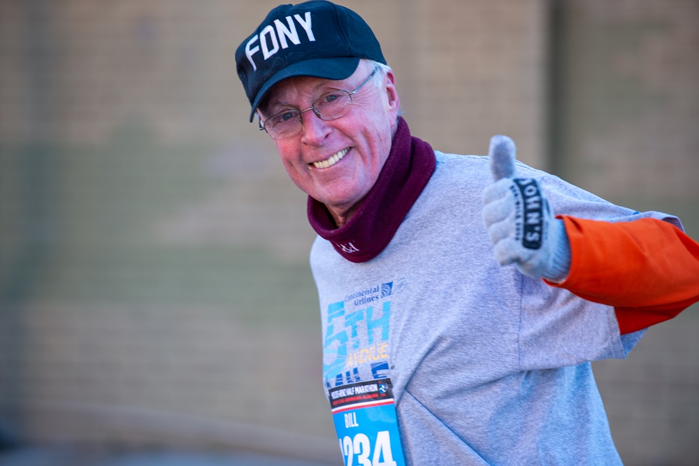 man smiling while running