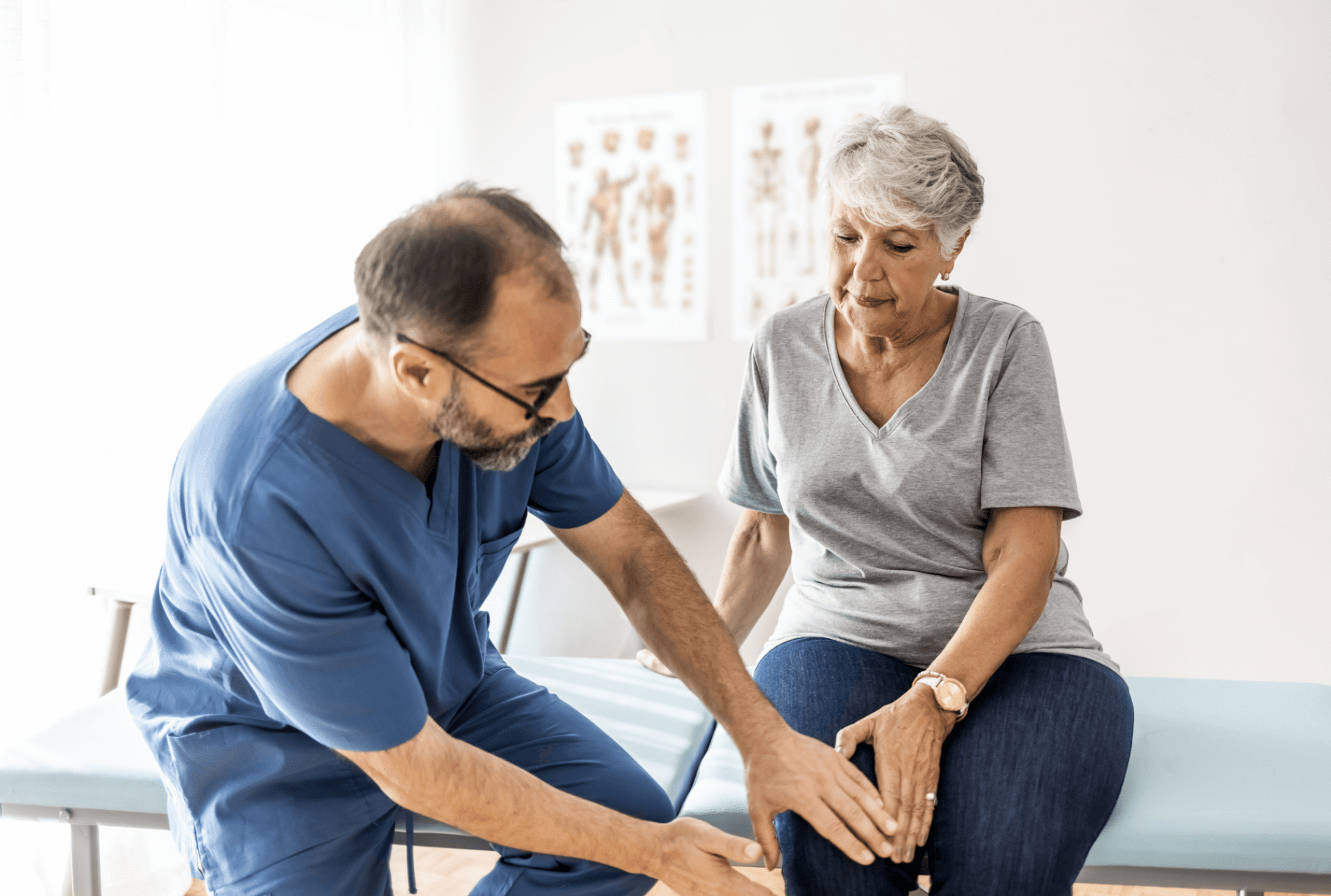 a doctor tending to a patient's knee