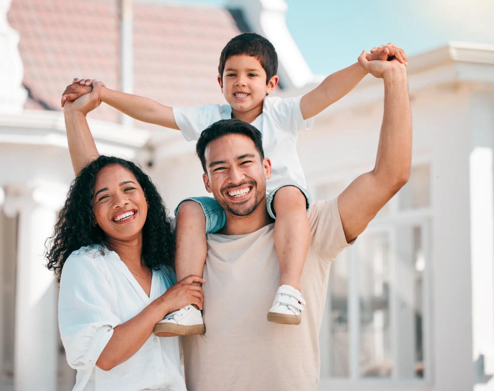 family gathered together sunny day smiling