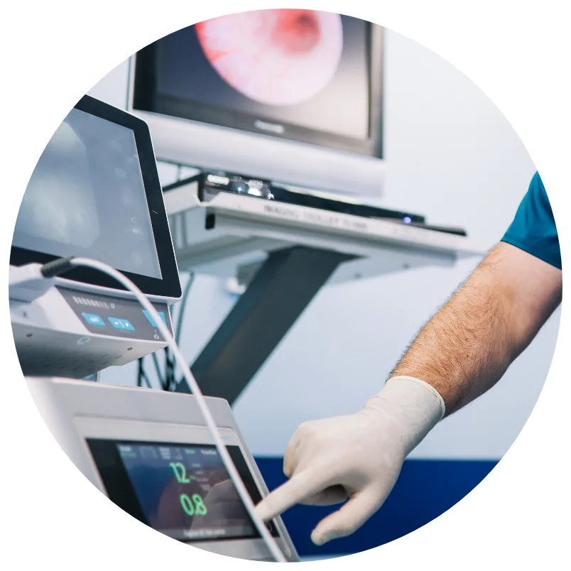 doctor pointing at machines