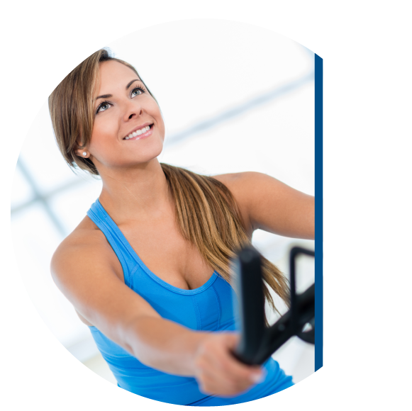woman working out shoulders at gym
