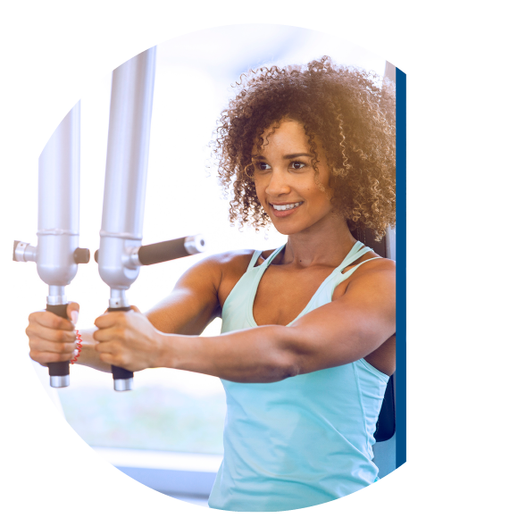 Middle age female lifting arm weights