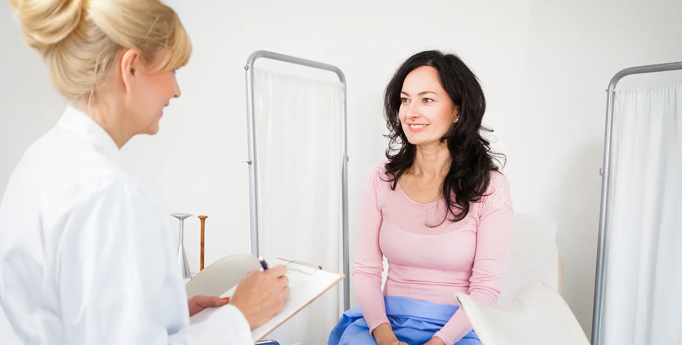 Woman recieving her yearly check up from her PCP