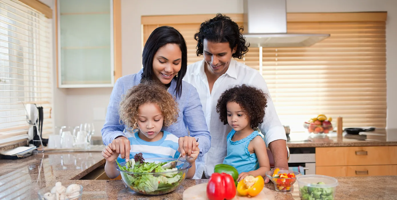 young black African American couple smiling, showing their bandages after getting vaccinated