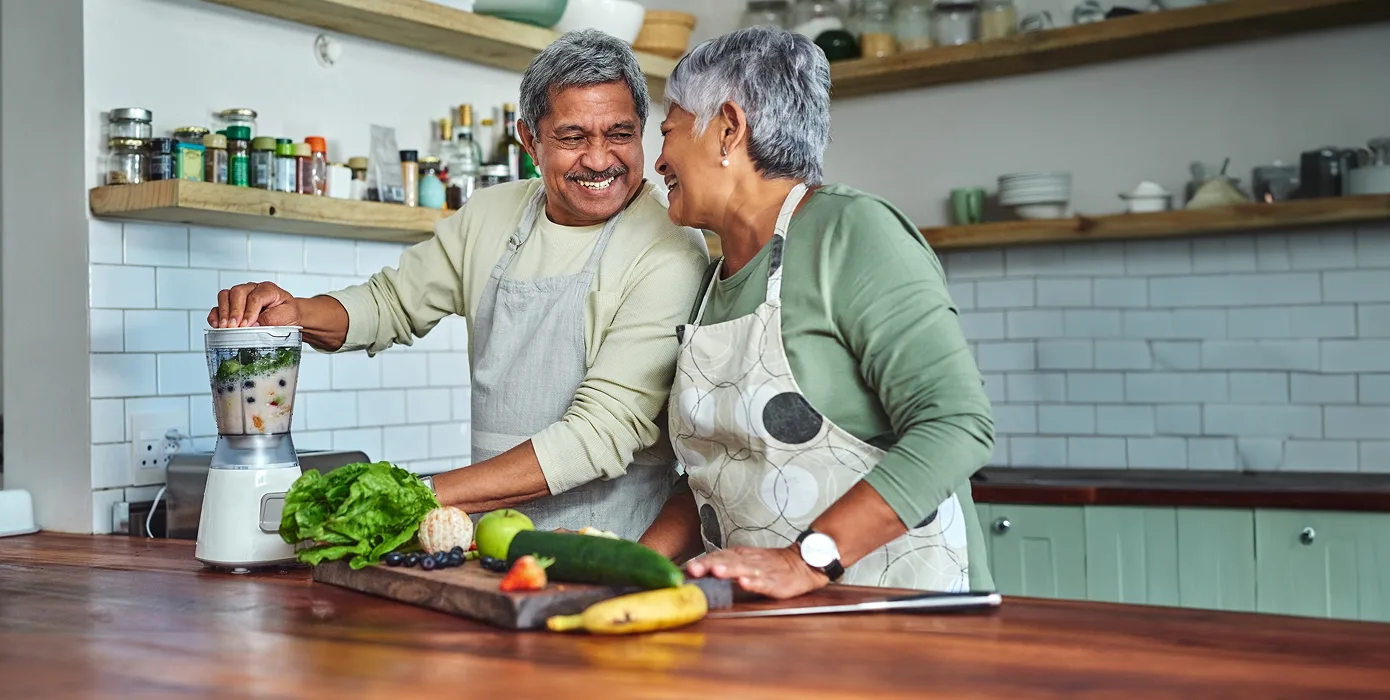 young black African American couple smiling, showing their bandages after getting vaccinated