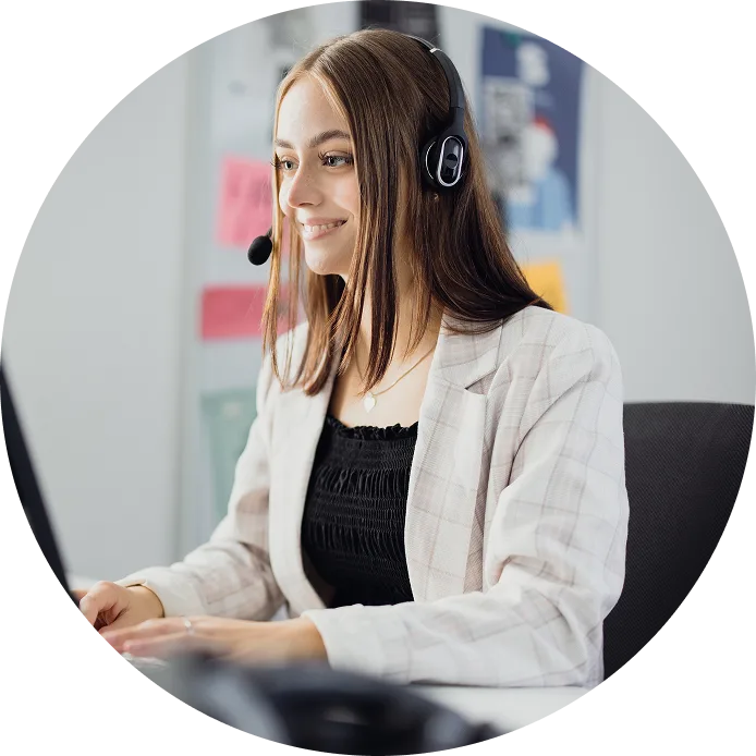 picture of a woman smiling while her blood pressure is checked in a doctor's office