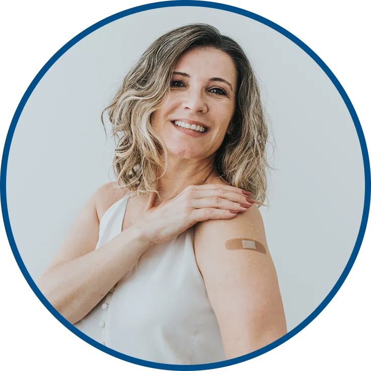 picture of a man smiling while he eats strawberries & yogurt