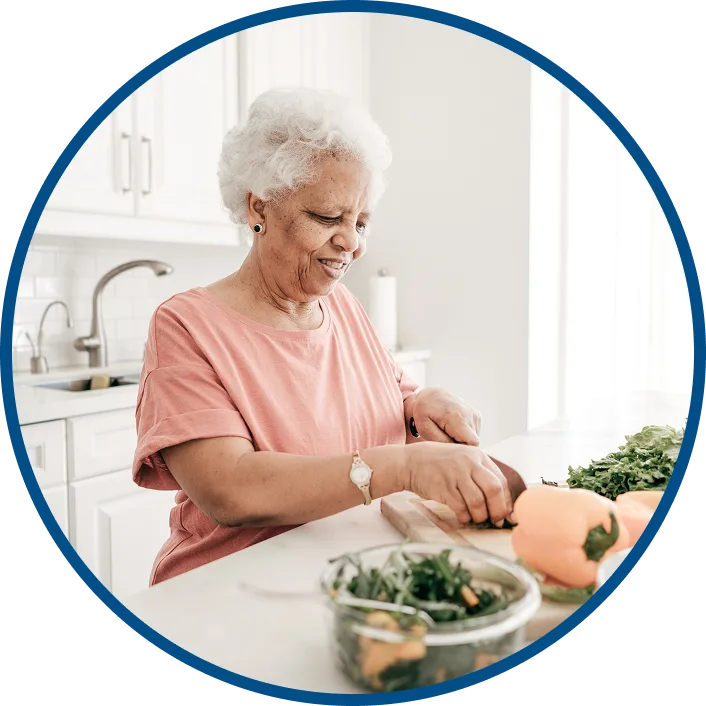 image of an older Aisan man performing stretches while seated