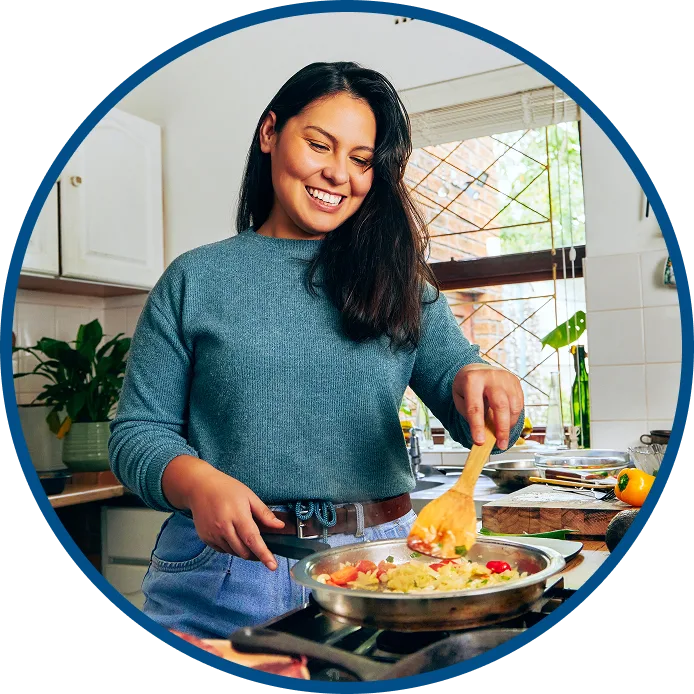 image of a woman cooking in the kitchen