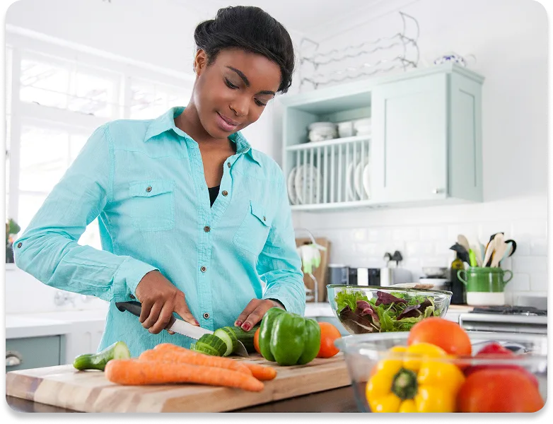 image of a woman prepping food in her kitchen