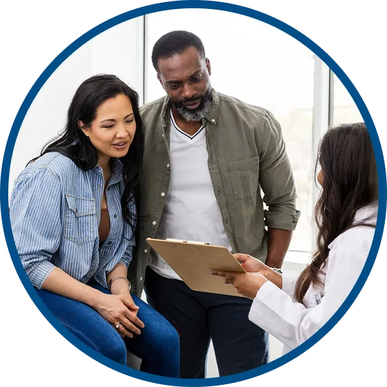 picture of a woman smiling while chopping vegetables in her kitchen