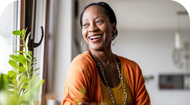 photo of a woman smiling in her home