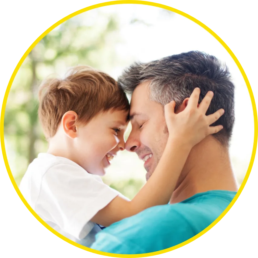 Father and Son holding each other, smiling