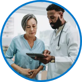 Medical professionals reviewing chart in medical office setting